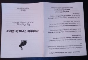 Zine folded in half upside down.